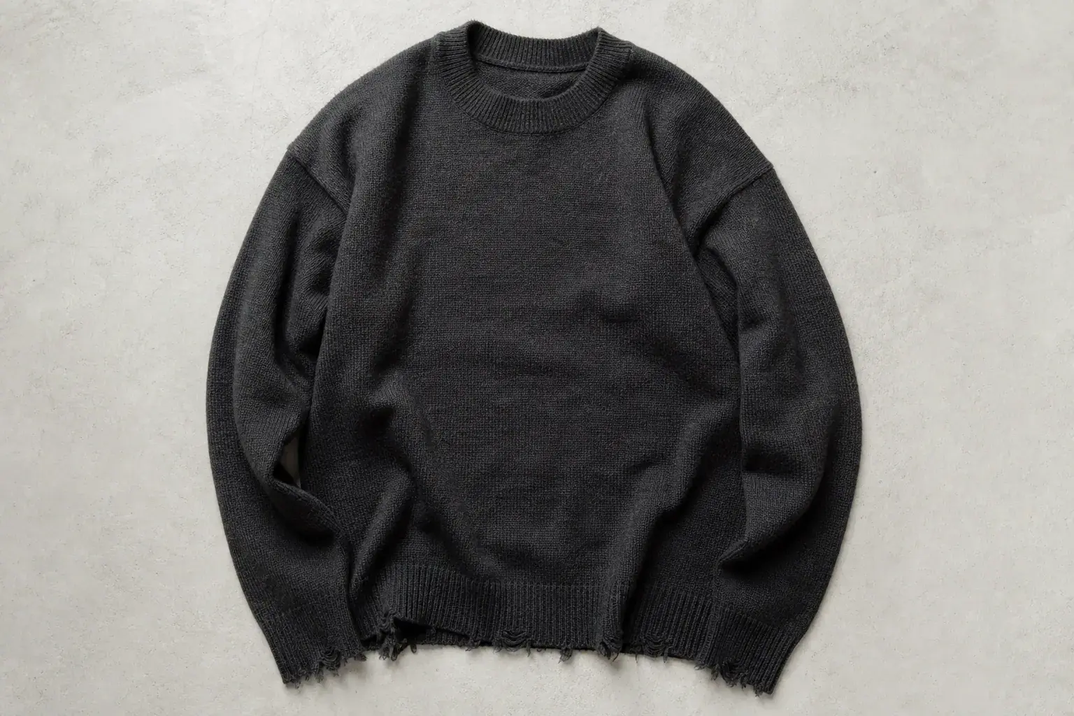 The Distressed Hem Sweater